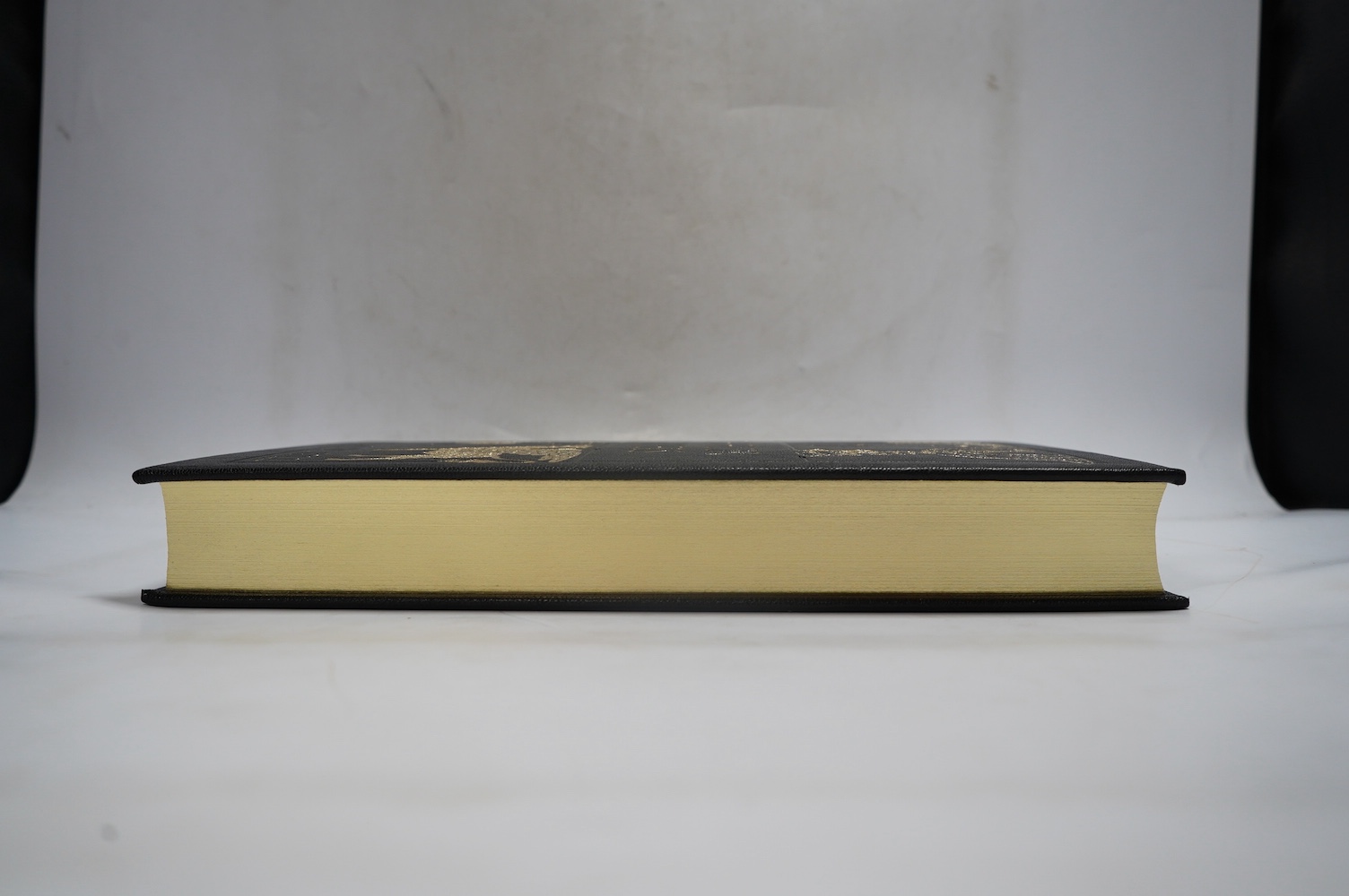 Folio Society - Gill, Eric - The Four Gospels, one of 2750, monochrome illustrations, all edges gilt, original gilt decorated full black morocco in black cloth drop box, includes Essays, by John Dreyfus & Robert Gibbings